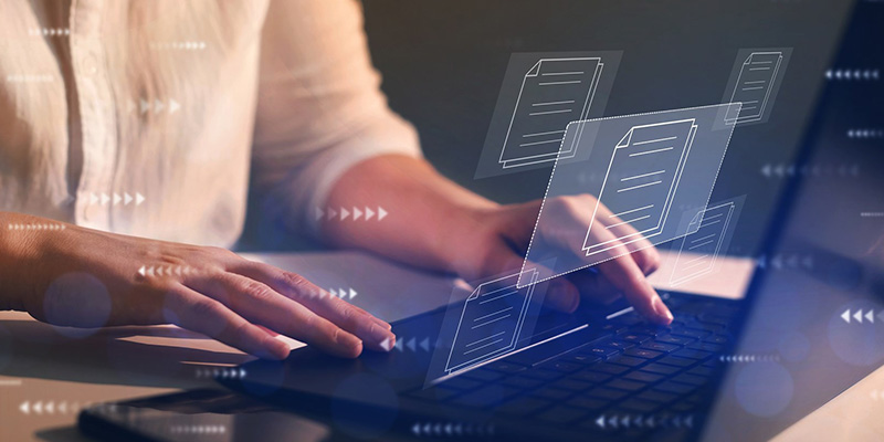 Hands typing on keyboard