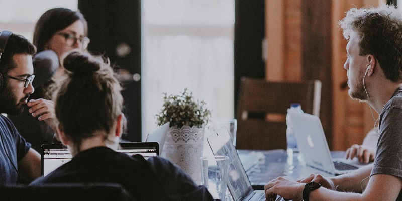 Coworkers sitting around a table