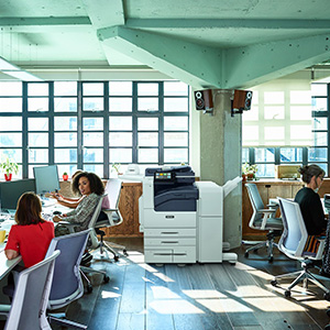 People working in an open office space