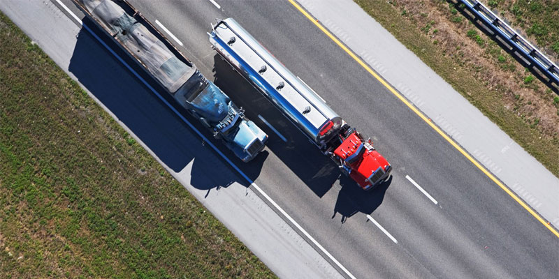 trucks driving on highway