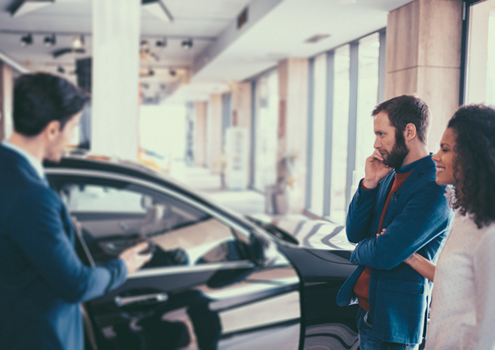 woman man car dealership